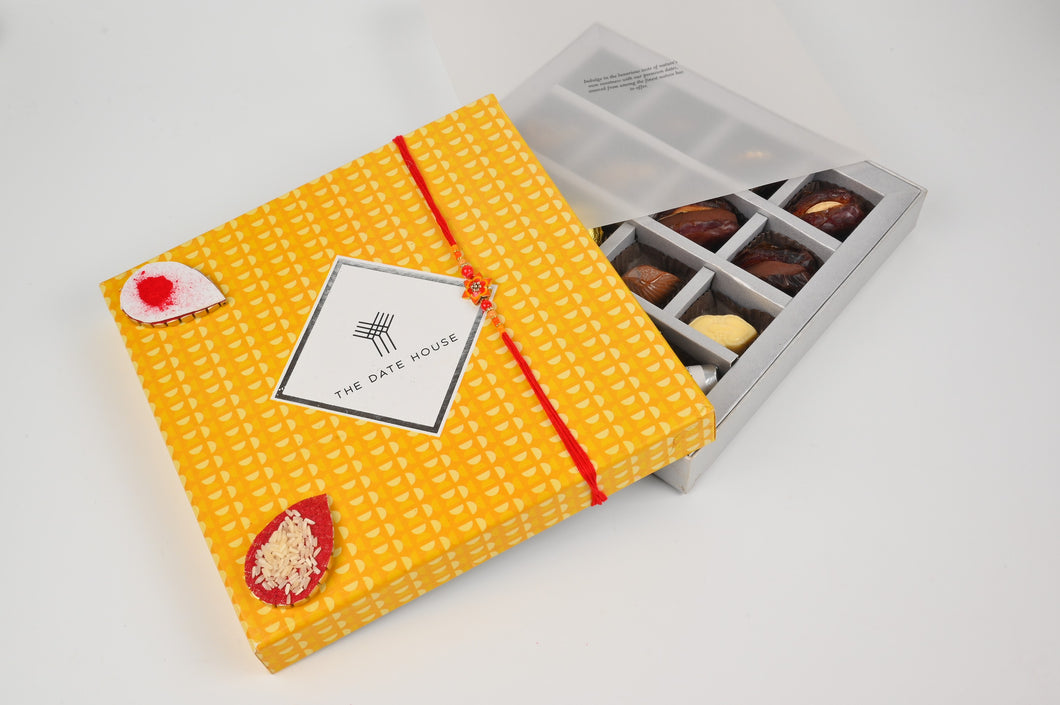 Rakhi Hamper Sunshine Yellow Gift Box  Assorted  dates & Chocolates