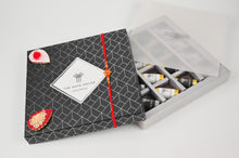 Load image into Gallery viewer, Rakhi Hamper Graphite Black &amp; Silver  Gift Box16 PCs Chocolate dates
