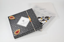 Load image into Gallery viewer, Rakhi Hamper Graphite Black &amp; Silver  Gift Box16 PCs Chocolate dates
